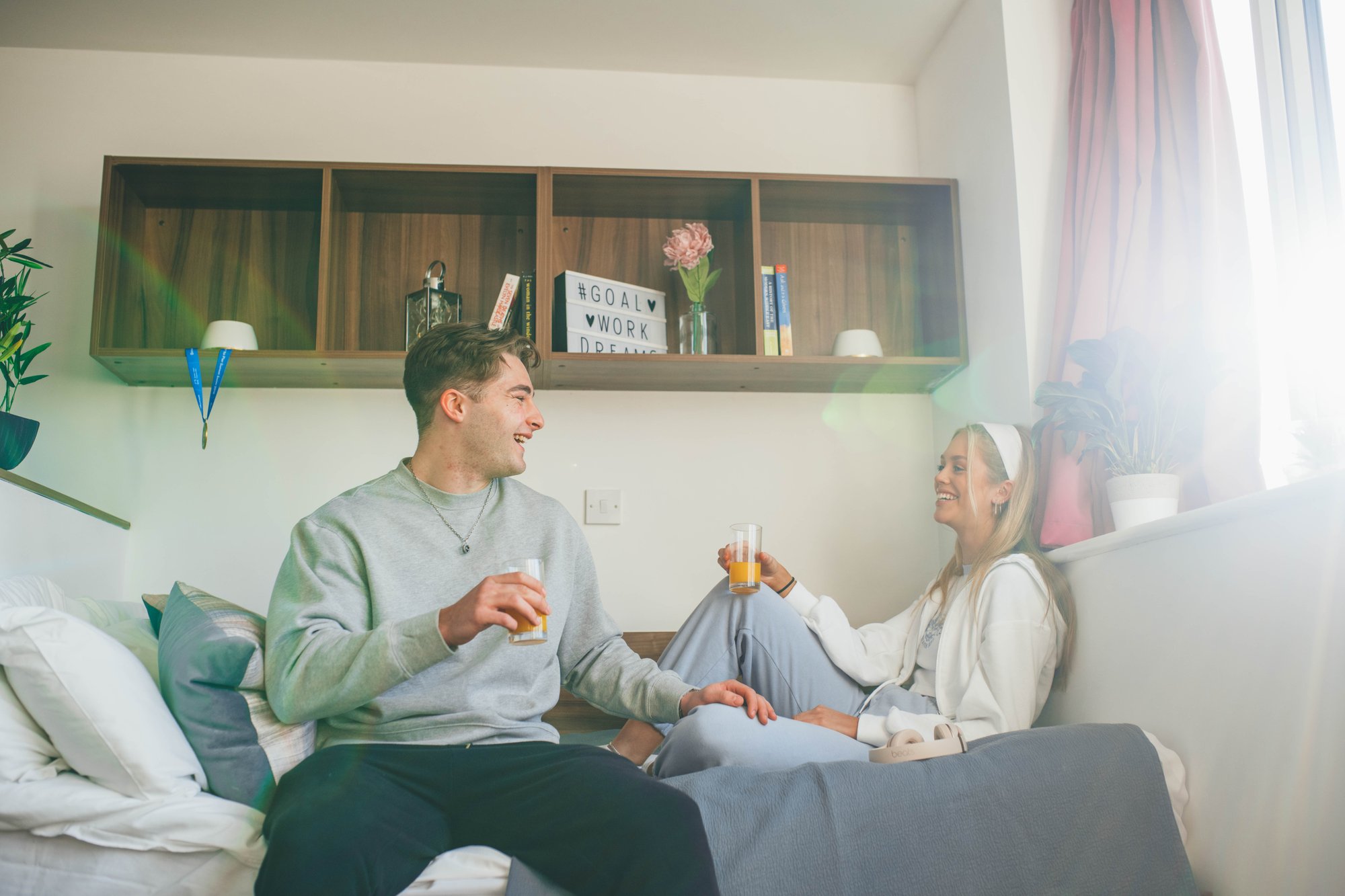 Two students chatting at Lulworth Student Accommodation Two students chatting at Lulworth Student Accommodation
