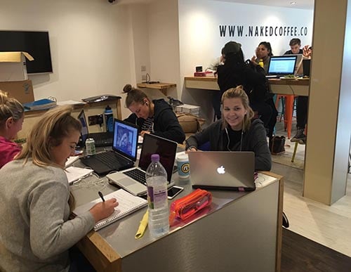 students studying at naked coffee