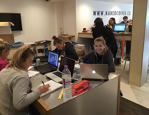 students studying at naked coffee students studying at naked coffee